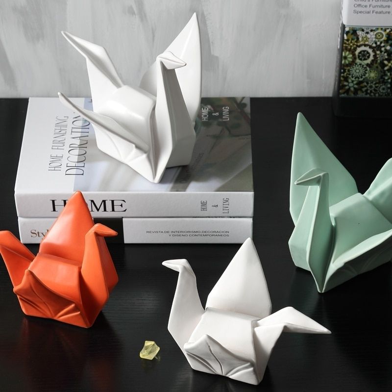 Estátua de origami de caçarola laranja