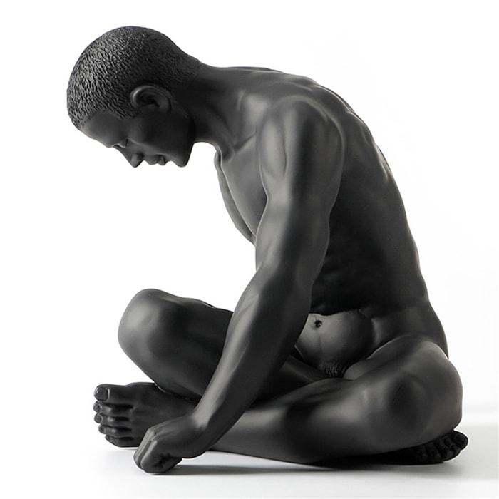 Estátua preguiçosa sentada